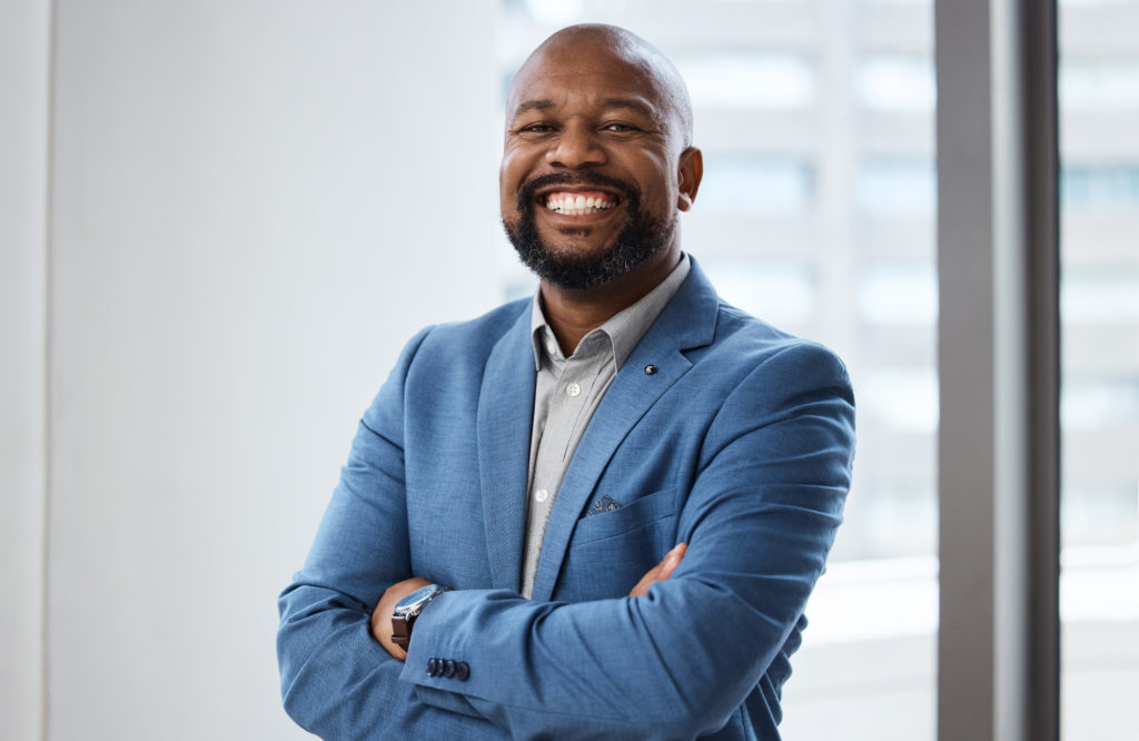 Confident businessman smiling