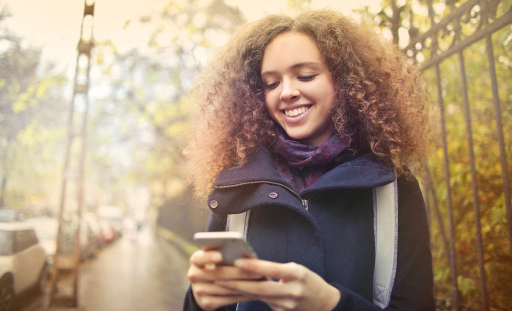 Woman on phone connecting to pay per call