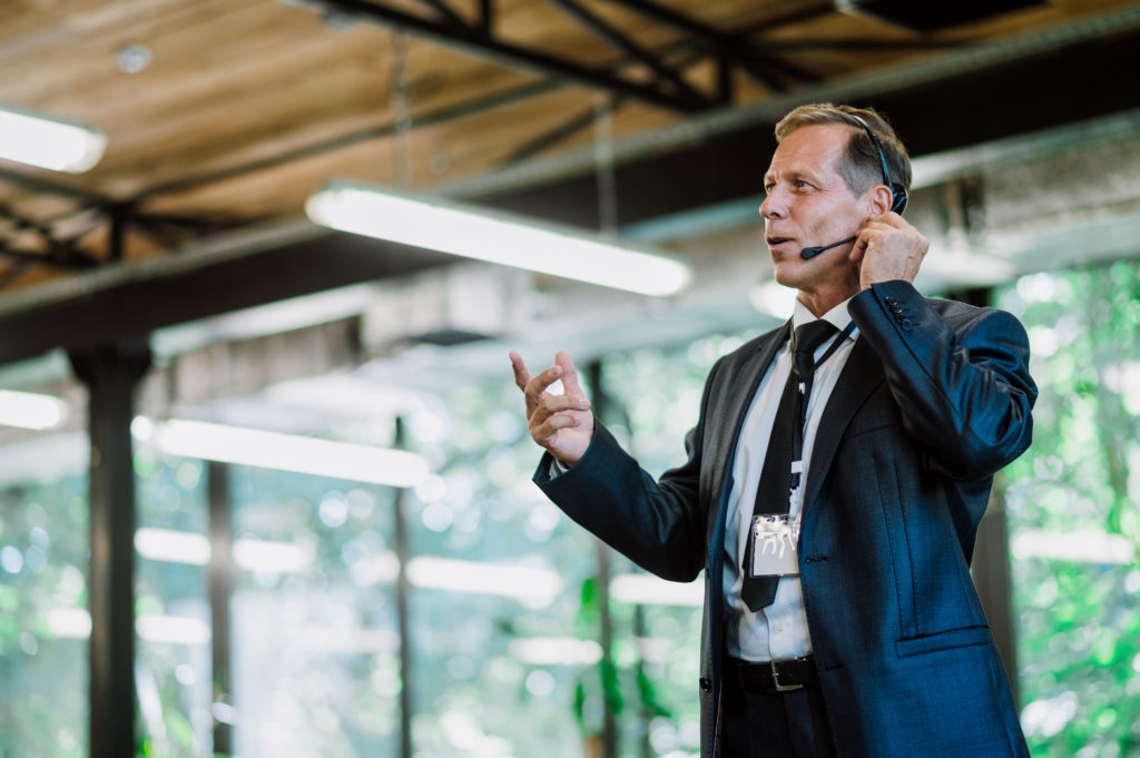 Business man having a conversation about pay-per-call strategy