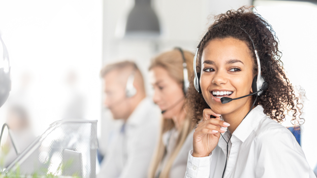 Women working in a call center taking pay-per-call calls
